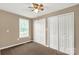 Neutral bedroom with wall to wall carpeting, window, and a double closet at 1215 Eastcreek Rd, Fort Lawn, SC 29714