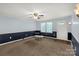 Bright living room with neutral carpet, offering a versatile space for relaxation and entertainment at 1215 Eastcreek Rd, Fort Lawn, SC 29714