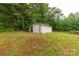 Exterior of the shed located in a large backyard with green grass at 1215 Eastcreek Rd, Fort Lawn, SC 29714