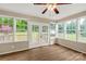 Bright sunroom with windows and doors to view outdoor surroundings at 1215 Eastcreek Rd, Fort Lawn, SC 29714