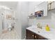 Cozy bathroom with a modern vanity, tiled floors, and convenient walk-in shower at 123 Carriage House Dr, Kannapolis, NC 28081