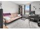 Cozy bedroom with a large window and ample space for both relaxation and productivity at 123 Carriage House Dr, Kannapolis, NC 28081