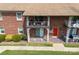Charming brick apartment building featuring two-level balconies with decorative wrought iron railings at 123 Carriage House Dr, Kannapolis, NC 28081