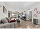 Inviting living room featuring stylish furniture, wood flooring, and natural light from the sliding glass door at 123 Carriage House Dr, Kannapolis, NC 28081