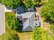 An aerial view of a home with a backyard deck and lush green lawn at 1257 Mill Race Ln, Matthews, NC 28104