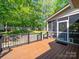 Spacious back deck ideal for entertaining, offering outdoor views of a fenced in yard at 1257 Mill Race Ln, Matthews, NC 28104