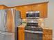 Well-equipped kitchen featuring stainless steel appliances, granite countertops, and ample cabinet space for all your cooking needs at 1257 Mill Race Ln, Matthews, NC 28104