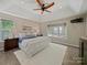 Inviting main bedroom features natural light, ceiling fan, and neutral tones, creating a serene and restful atmosphere at 1257 Mill Race Ln, Matthews, NC 28104