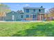 Backyard with an in-ground pool and covered patio, ideal for outdoor entertaining at 12620 Sulgrave Dr, Huntersville, NC 28078