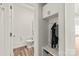 Bright bathroom featuring a toilet with a wooden floor and a storage place at 1316 Colgher St, Mint Hill, NC 28227