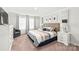 Cozy main bedroom with neutral tones, accent pillows, and modern decor at 1316 Colgher St, Mint Hill, NC 28227