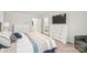 Bright main bedroom with a large bed, dressers, and natural light at 1316 Colgher St, Mint Hill, NC 28227