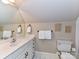 Neutral bathroom with white vanity, updated fixtures, and a large mirror at 14650 Trading Path Way, Charlotte, NC 28277