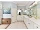 Spacious bathroom with dual vanity, mirrors, and separate soaking tub at 14650 Trading Path Way, Charlotte, NC 28277