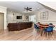 Open concept living and dining room with hardwood floors and ample natural light at 14650 Trading Path Way, Charlotte, NC 28277