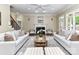 Elegant living room with fireplace, neutral tones, and comfortable seating at 14650 Trading Path Way, Charlotte, NC 28277