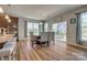 Cozy dining area adjacent to the kitchen with sliding glass door at 14925 Baldridge Dr, Huntersville, NC 28078