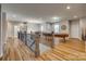 Upstairs game room with a pool table and wood flooring, providing an inviting space for recreation at 14925 Baldridge Dr, Huntersville, NC 28078