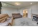 Spacious living area with comfortable seating, an open floor plan, and abundant natural light at 14925 Baldridge Dr, Huntersville, NC 28078