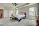 Large main bedroom with neutral tones, great natural light, and plush carpeting at 14925 Baldridge Dr, Huntersville, NC 28078