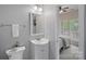 Well-maintained bathroom features modern fixtures and a tile floor at 156 Pecan Hills Dr, Mooresville, NC 28115