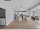 Open concept kitchen featuring an island and a bright dining room with backyard views at 156 Pecan Hills Dr, Mooresville, NC 28115