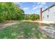 Expansive backyard featuring mature trees and plenty of green space for outdoor activities and relaxation at 1640 English Knoll Dr, Matthews, NC 28105