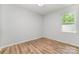 Cozy bedroom with natural light and wood flooring at 1640 English Knoll Dr, Matthews, NC 28105
