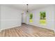 Bright dining room with large windows and modern lighting at 1640 English Knoll Dr, Matthews, NC 28105