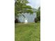 Charming two-story home featuring a fresh blue exterior, white trim, and a well-maintained front lawn at 1640 English Knoll Dr, Matthews, NC 28105