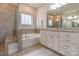 Bathroom featuring a walk-in shower, soaking tub and double sink at 16711 Monocacy Blvd, Huntersville, NC 28078