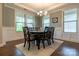 An open, sun-drenched dining room that's perfect for Gathering meals and entertaining at 16711 Monocacy Blvd, Huntersville, NC 28078