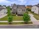 Beautiful two-story home featuring a manicured lawn and charming curb appeal at 16711 Monocacy Blvd, Huntersville, NC 28078