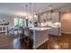 Spacious kitchen island with counter seating, plus view to open dining area at 16711 Monocacy Blvd, Huntersville, NC 28078