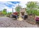 An outdoor stone fireplace with seating area creates a cozy and inviting space for relaxation at 16711 Monocacy Blvd, Huntersville, NC 28078