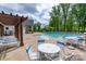 Community pool area with patio seating and a large swimming pool for neighborhood residents at 16711 Monocacy Blvd, Huntersville, NC 28078