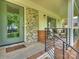 A welcoming porch with stylish furniture, offering an ideal space to unwind at 1733 Piccadilly Dr, Charlotte, NC 28211