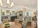 Bright open floor plan showing modern kitchen and sunlit living space at 1733 Piccadilly Dr, Charlotte, NC 28211