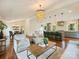 Open concept living space showcasing living, dining, and kitchen areas with hardwood floors at 1733 Piccadilly Dr, Charlotte, NC 28211
