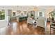 Open floor plan featuring a modern kitchen, expansive island, and comfortable living area at 1733 Piccadilly Dr, Charlotte, NC 28211