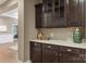 Butler's pantry features custom cabinetry, quartz countertops, and modern hardware at 1737 Cavaillon Dr, Waxhaw, NC 28173