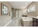 Main bathroom features a soaking tub, walk-in shower, and and vanities at 1737 Cavaillon Dr, Waxhaw, NC 28173