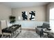 Well-appointed home office featuring natural light, neutral colors and ample workspace at 1737 Cavaillon Dr, Waxhaw, NC 28173