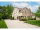 Lovely home featuring a large driveway, attached garage and manicured landscaping at 1737 Cavaillon Dr, Waxhaw, NC 28173