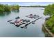 Breathtaking aerial perspective of a waterfront community, highlighting private boat docks and the serene lake setting at 20614 Pointe Regatta Dr, Cornelius, NC 28031