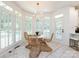 Cozy breakfast nook with bright windows and stylish wicker chairs at 216 Liriope Ct, Matthews, NC 28105