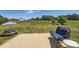 Great yard with a patio, backyard seating, a picnic table, and a swing set in the distance at 2206 Mills Harris Rd, Wingate, NC 28174