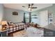 Charming bedroom with a cozy bed, vintage-inspired decor, and plenty of natural light at 2206 Mills Harris Rd, Wingate, NC 28174