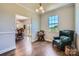 Bright dining room featuring hardwood floors, a window with a view, and comfortable seating at 2206 Mills Harris Rd, Wingate, NC 28174
