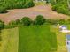 Aerial view of property with home, fenced in area, and pool at 2225 Corinth Church Rd, Monroe, NC 28112